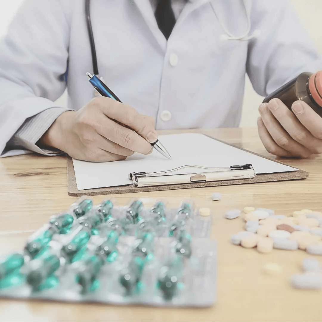 Herbs and natural healing ingredients arranged on a light surface